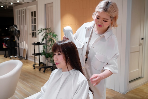 Woman at a japanese hairdressers getting her hair done