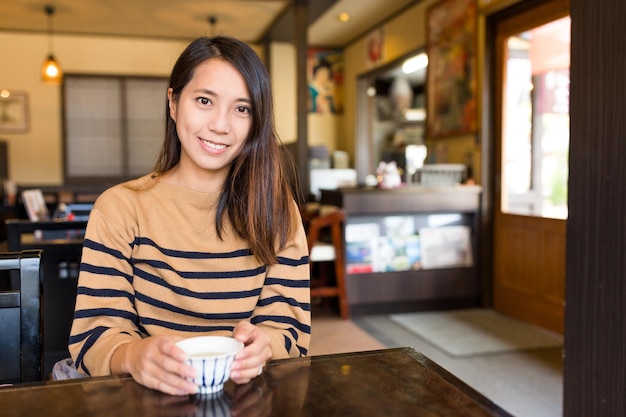 Woman in Japanese restaurant