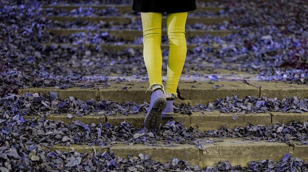 Woman in jeans and brown shoes