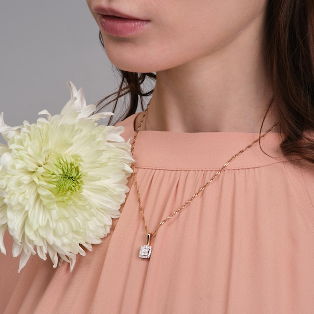 Woman Jewelery concept Woman hands close up wearing rings earrings