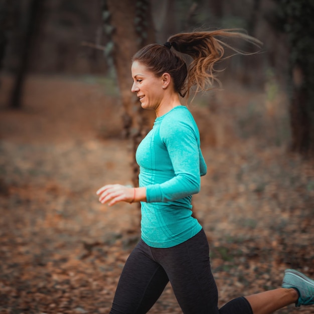Woman Jogging Outdoors in the Park