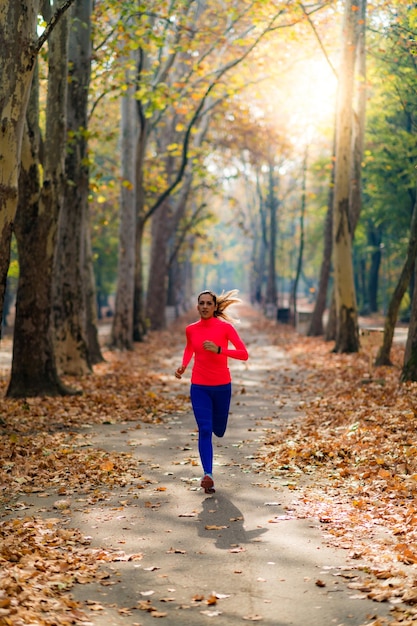 Woman Jogging Outdoors in Park