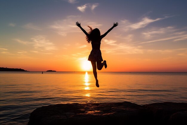 Woman Jumping for Joy at Sunrise