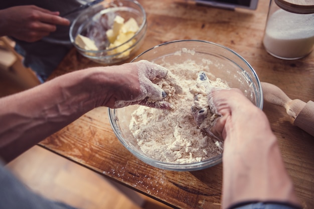 Woman kneading dough