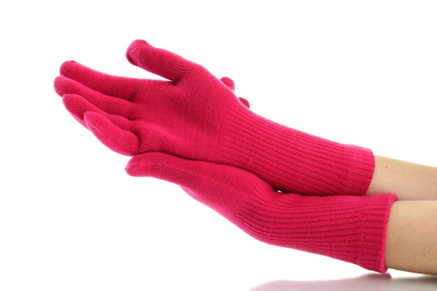 Woman knitted gloves on hands isolated on white