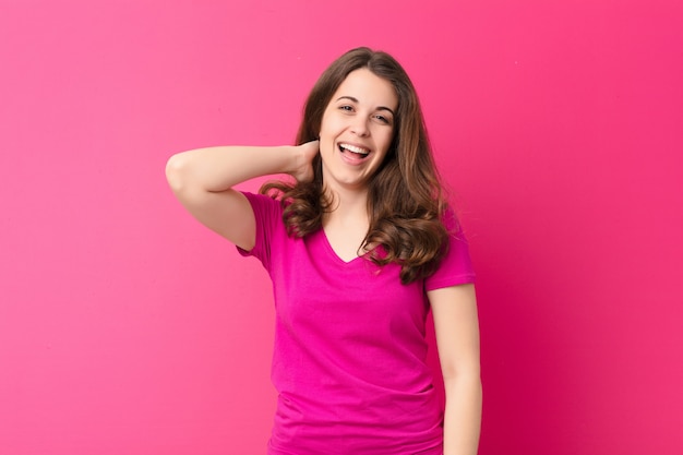 woman laughing cheerfully and confidently with a casual, happy, friendly smile