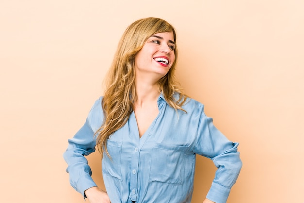 Woman laughing in studio