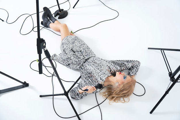 Woman laying on floor full shot