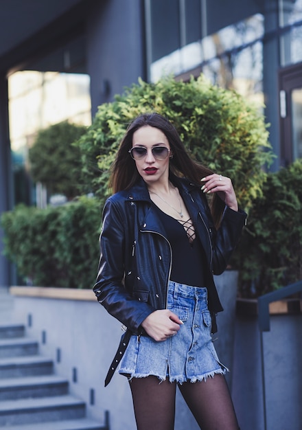 Woman in leather jacket