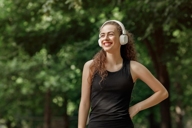 Woman listening to music on headphones