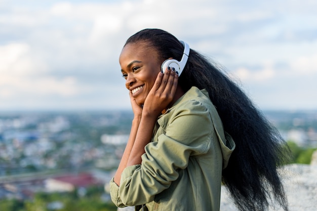 Woman listening to music with headphones