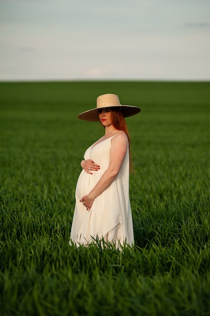 Woman in long white dress outdoor