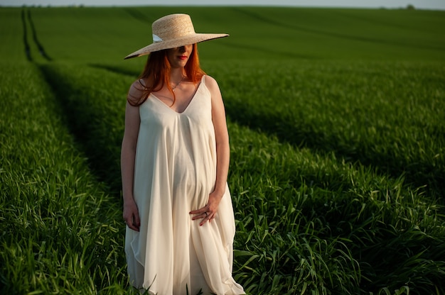 Woman in long white dress outdoor