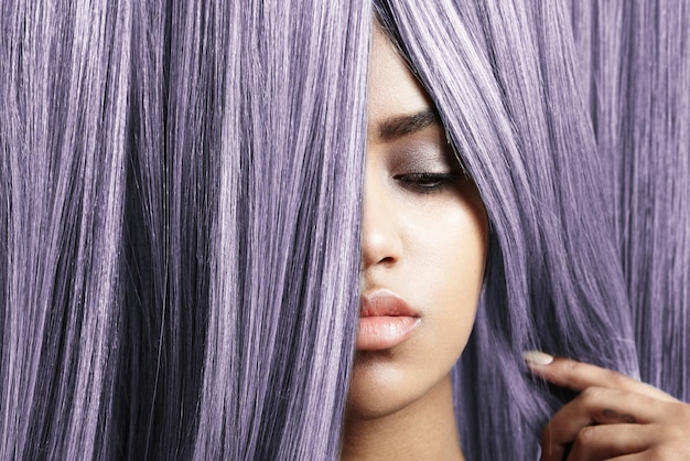 Woman look out from violet hair