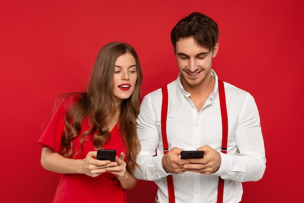 Woman looking at boyfriend smartphone