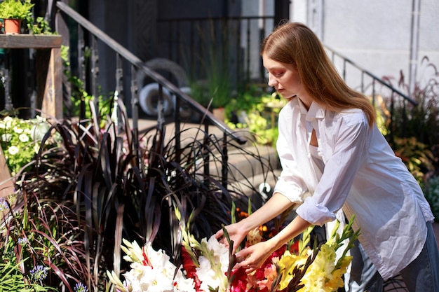 Woman looking at flowers in a shop