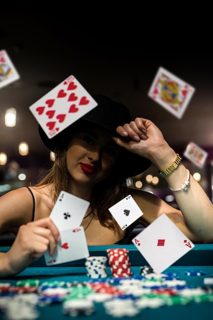 Woman looking in play cards in casino