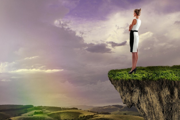 Woman looking at rainbow