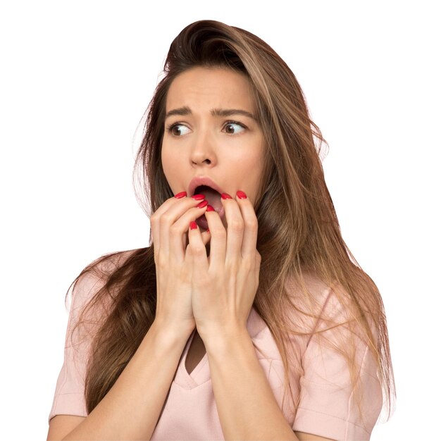 Photo woman looking shocked on white background