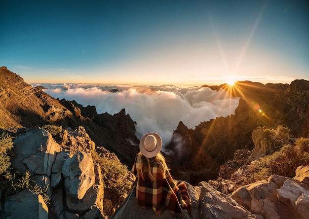 woman looking at view against clear sky
