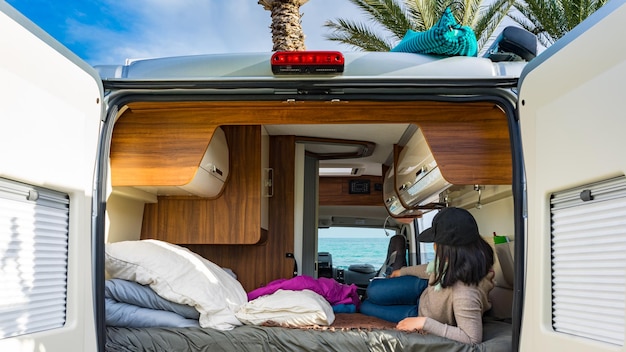 woman lying in motor home