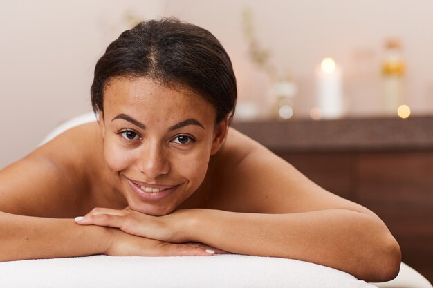 Woman lying on a spa table