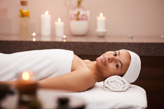 Woman lying on a spa table