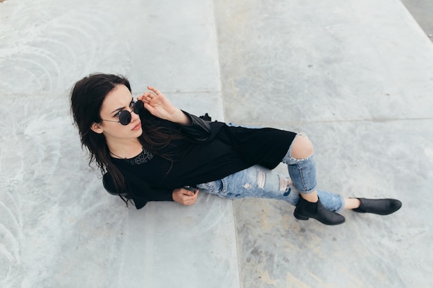 Woman lying on stairs