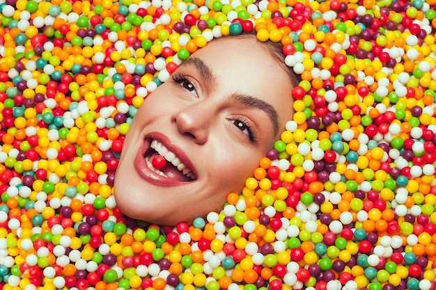 Woman lying on sweets