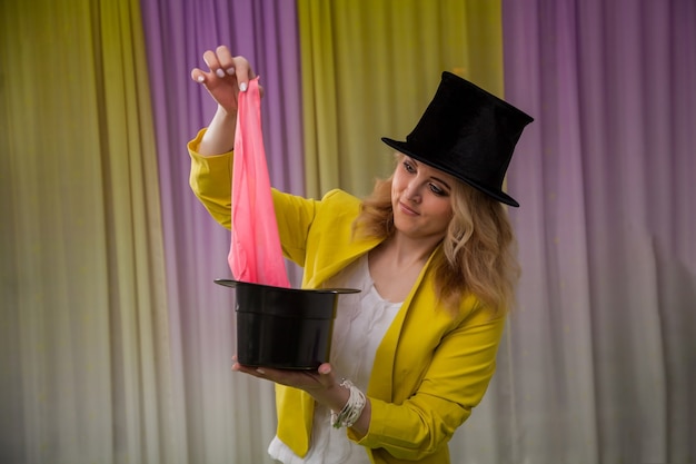Woman magician shows tricks