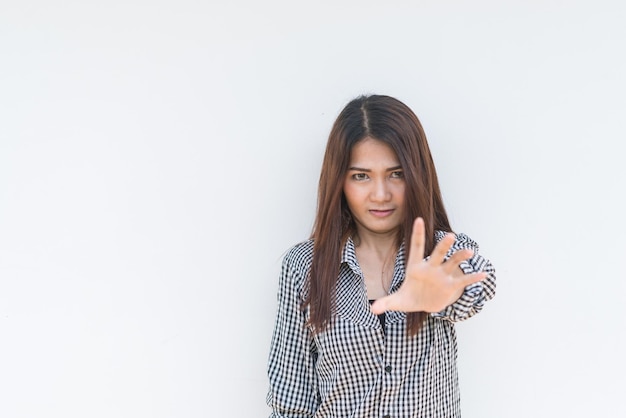 Woman make hand stop with five fingerselective focus