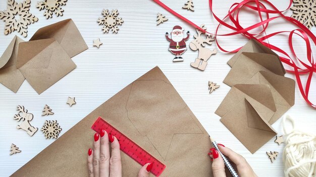 Woman makes Christmas advent calendar for kids.