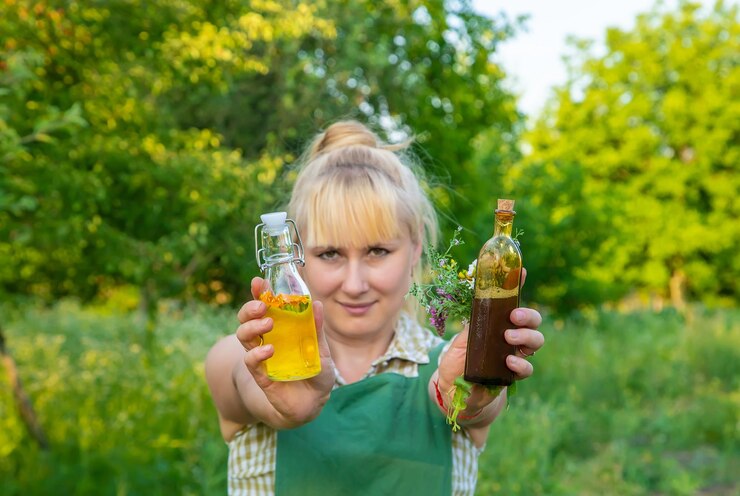 Photo a woman makes herbal tincture selective focus