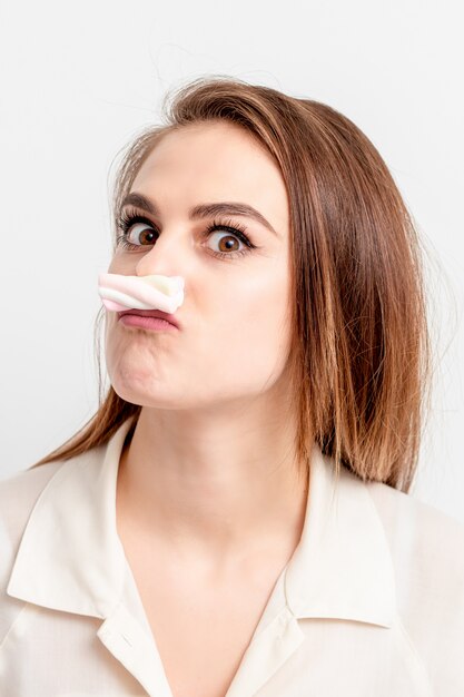 Woman makes marshmallow mustache