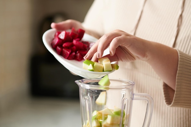 Woman Making Fruit Smoothie