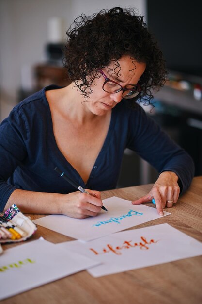 Woman making hand calligraphy