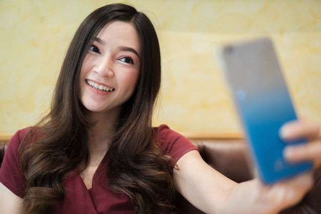 woman making selfie photo on a smartphone