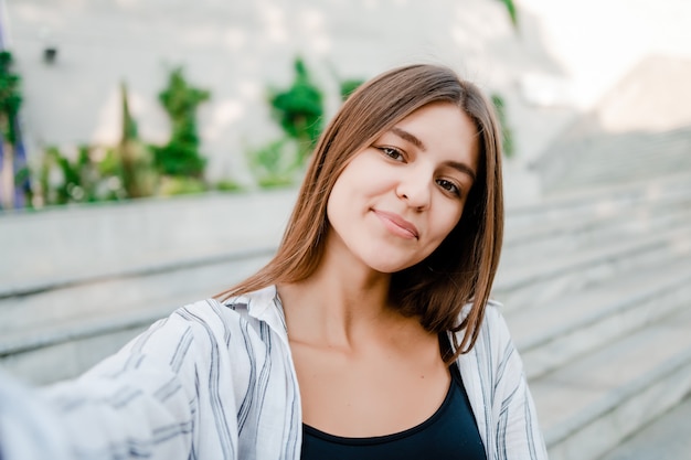 Woman making selfie