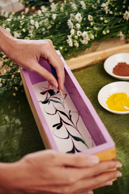 Woman making swirl soap