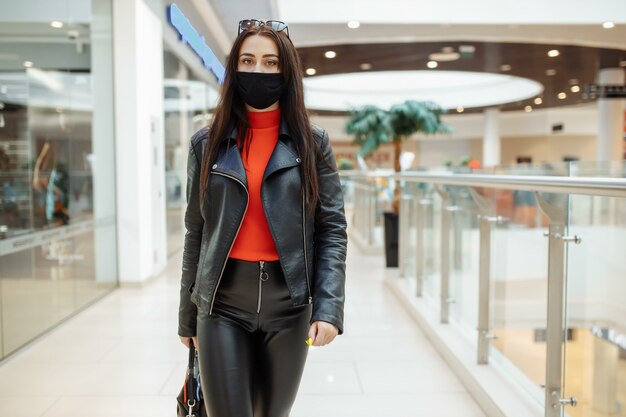 Woman at the mall wearing protective mask