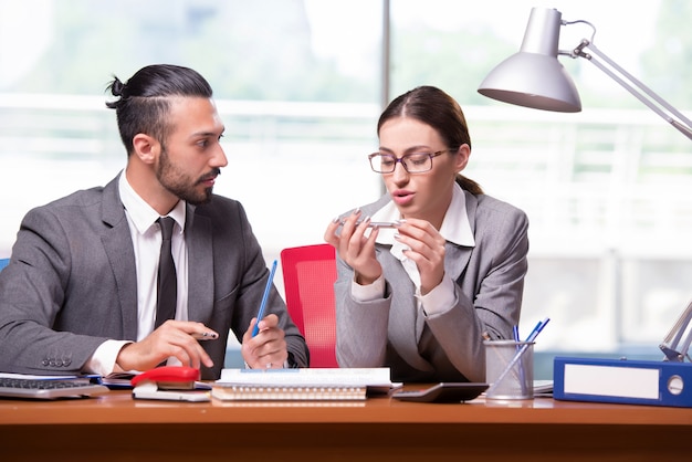 Woman and man in the business concept