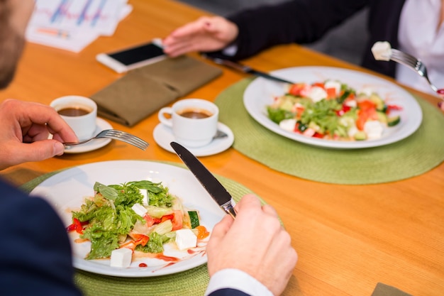 Woman and man on business lunch