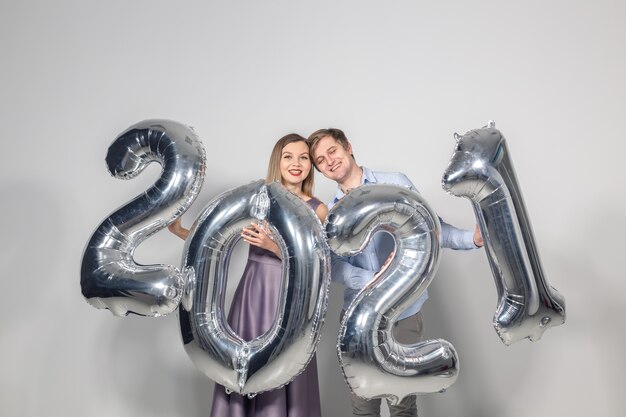 Woman and man celebrating new year