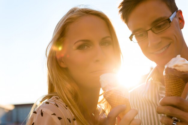 Woman and man eating an ice cream 