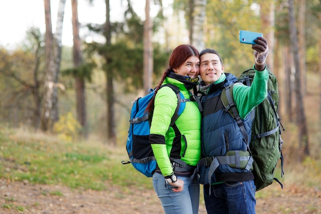 Woman and man taking selfie