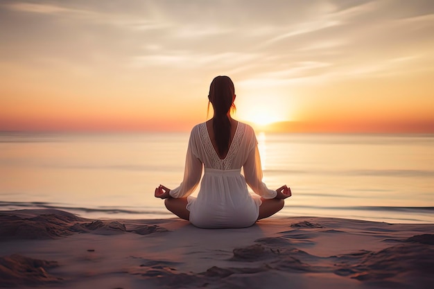 A woman meditating by the seaside at sunset AI technology generated image