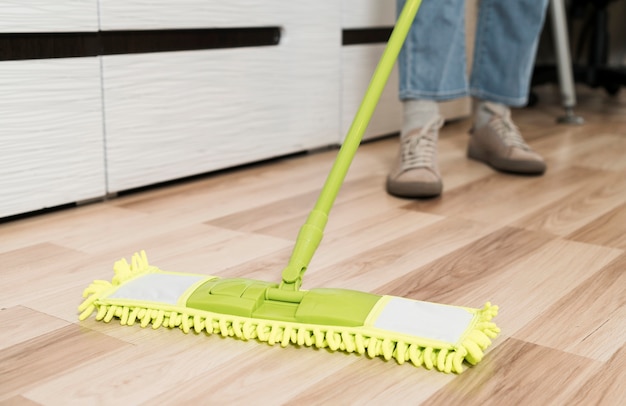 Woman mopping the floors