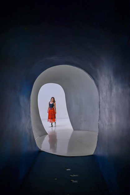 A woman in narrow view from inside out