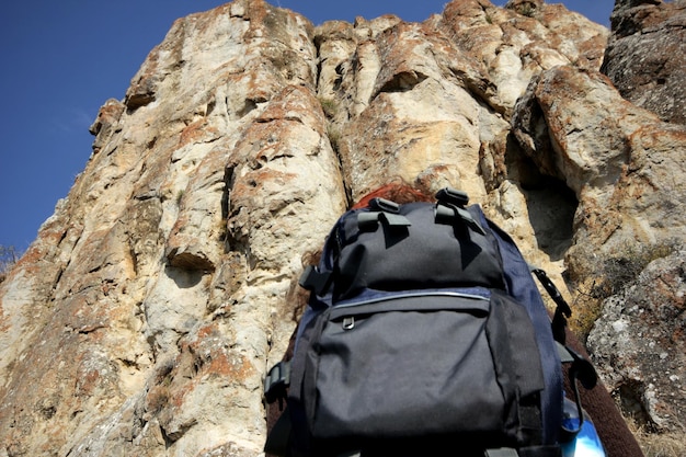 woman in nature with backpack