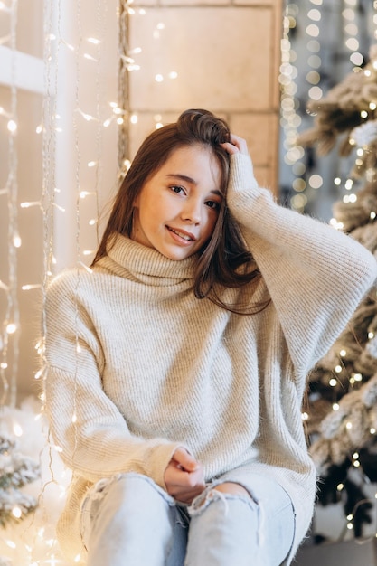 Woman near Christmas tree